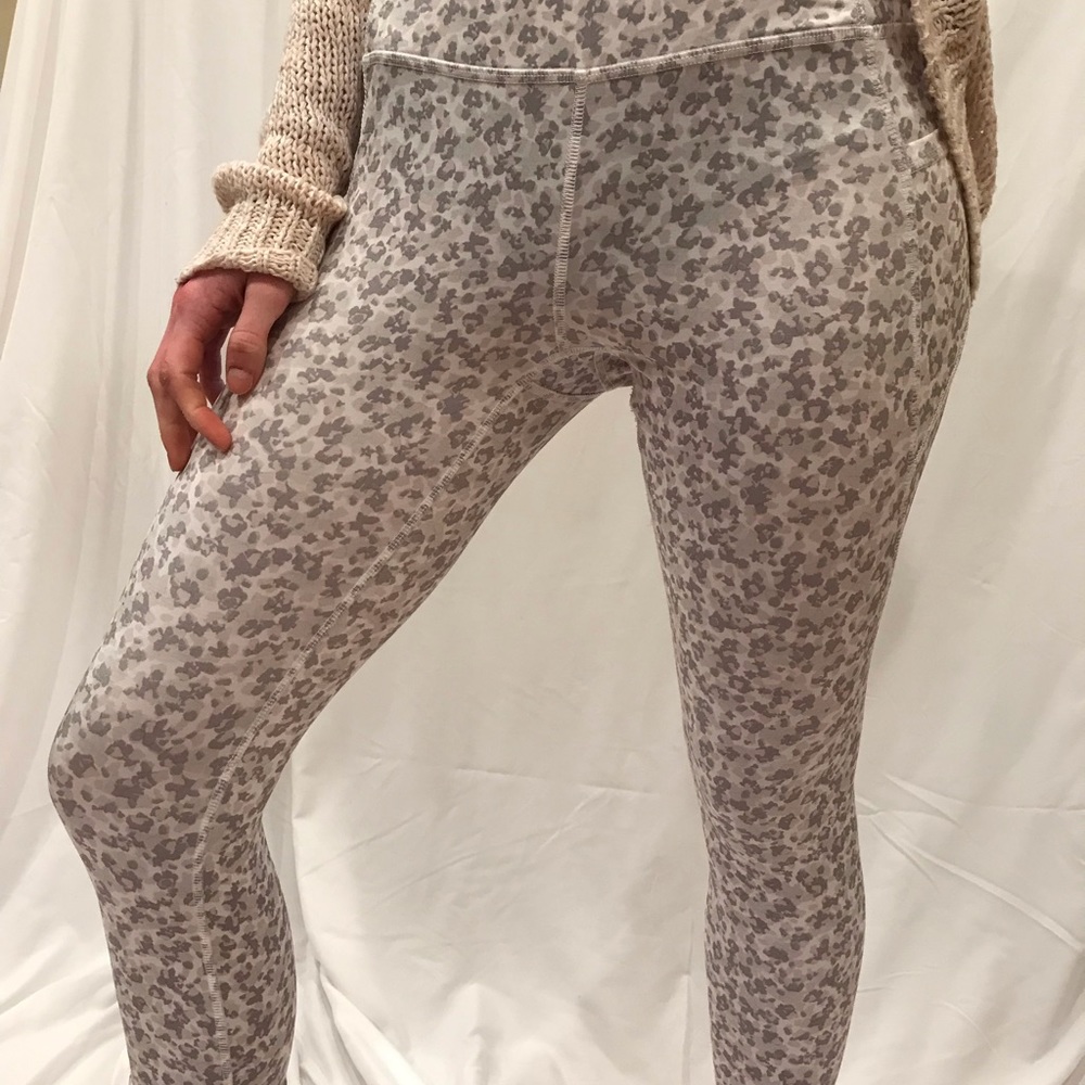 Gray, pink, and white leggings